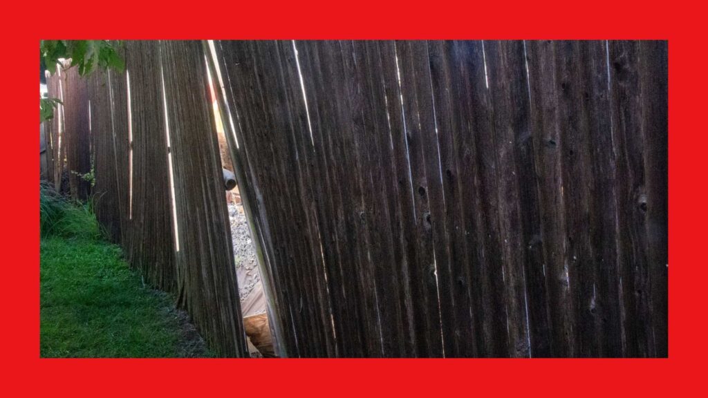 Leaning wood privacy fence repair in Western NC